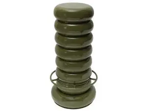 Barstol med moderne, rund form og glansfuld, ensfarvet grøn overflade.