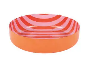 Skål med klar orange yderside, blød pink inderside med orange striber og skinnende overflade.