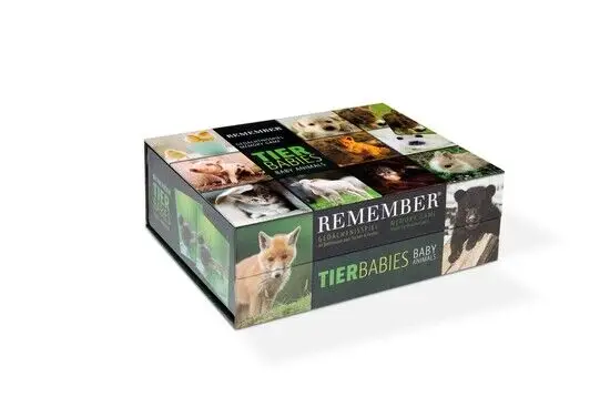 Kasse til huskespil med dyreunger, mærket "Remember" og "Tier Babies", med billeder af dyreunger.