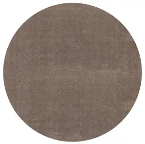 Rundt tæppe med sandfarve, jævn tekstur, ingen mønstre. Diameter: 200 cm.