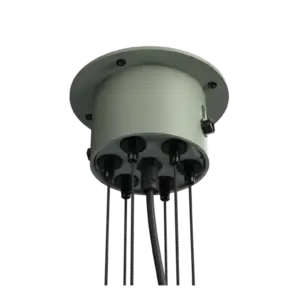 Central hub af Tonone BOLT CHANDELIER i flux green med synlige mekaniske forbindelser og ledninger.